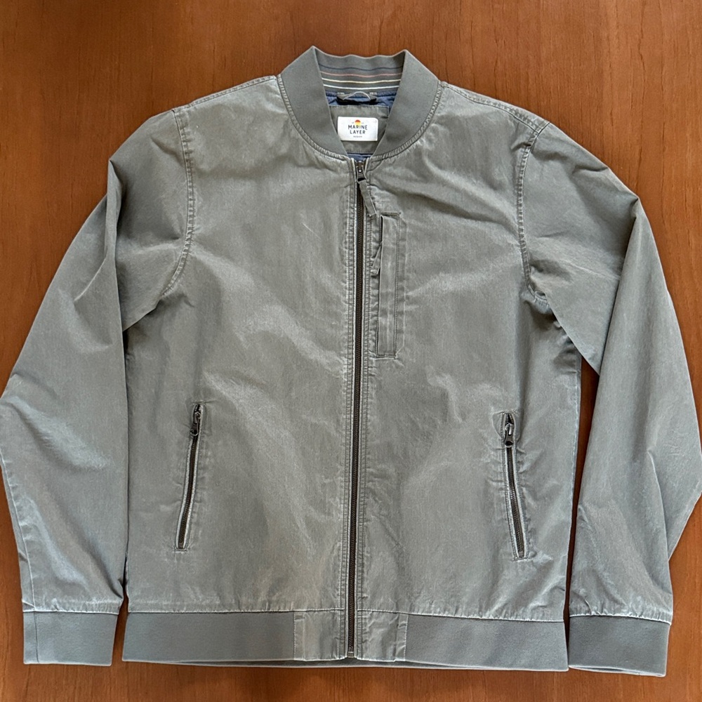 Marine layer Rossland Dry Wax Bomber Jacket. Color dusty olive